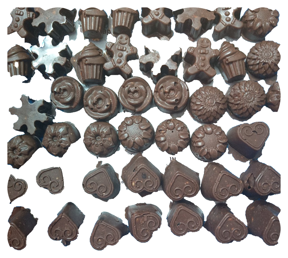 An owner-identified assortment of chocolates in heart, flower, cupcake and small figure shapes.
